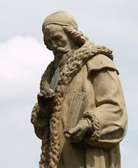 Статуя Яна Амоса Коменського з книгою «Дидактика» в лівій руці, м. Кунвальд Чехія